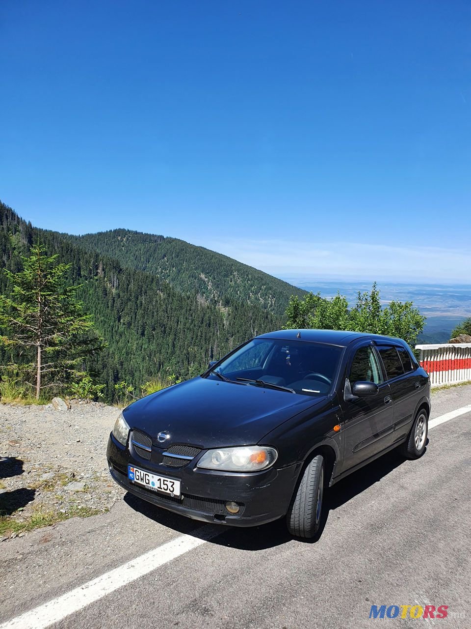 2005' Nissan Almera photo #1