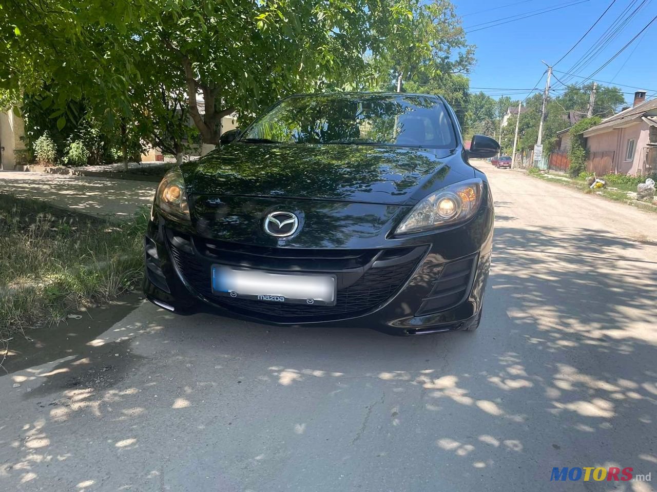 2011' Mazda 3 photo #1