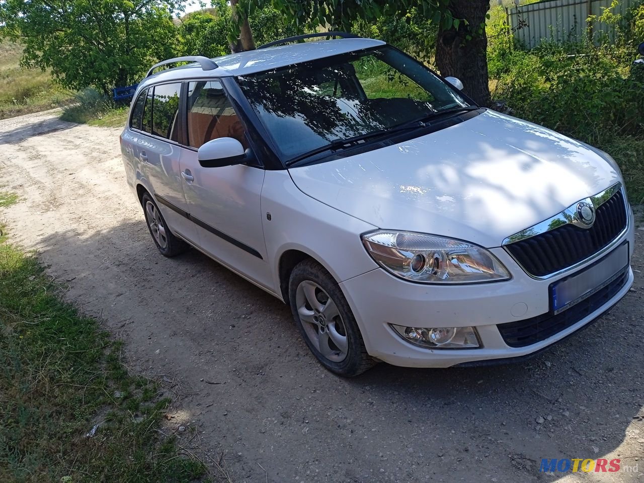 2012' Skoda Fabia photo #2