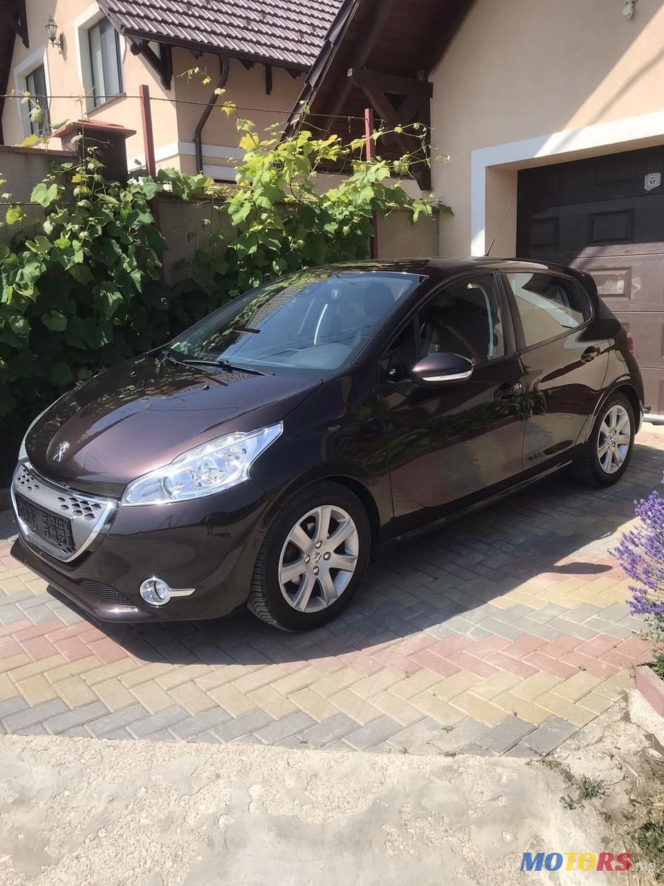 2012' Peugeot 208 photo #1