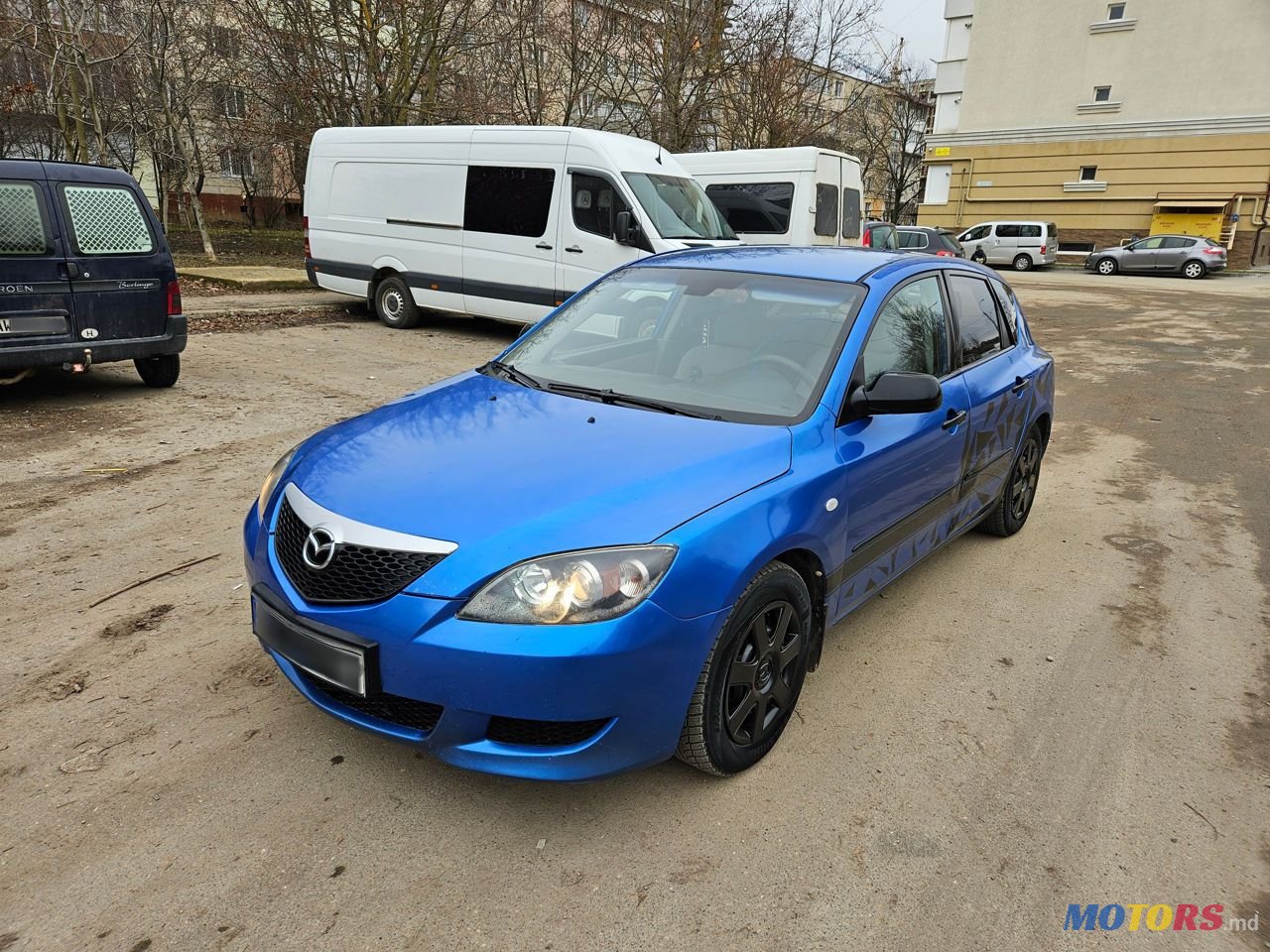 2006' Mazda 3 photo #1