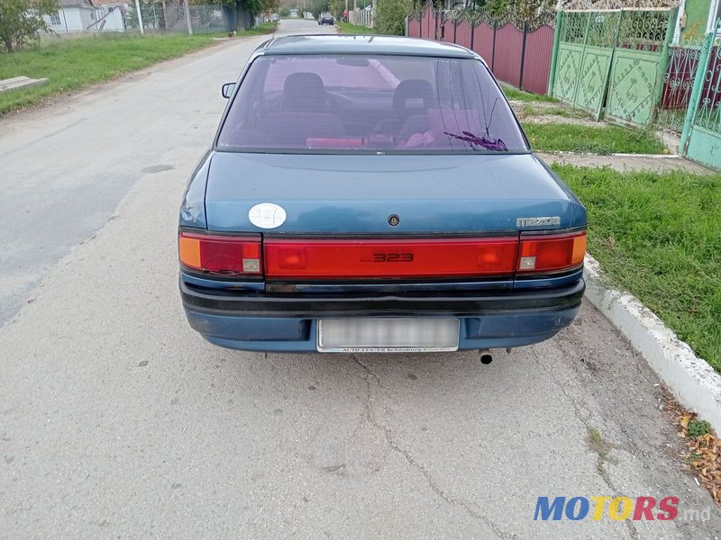 1990' Mazda 323 photo #1