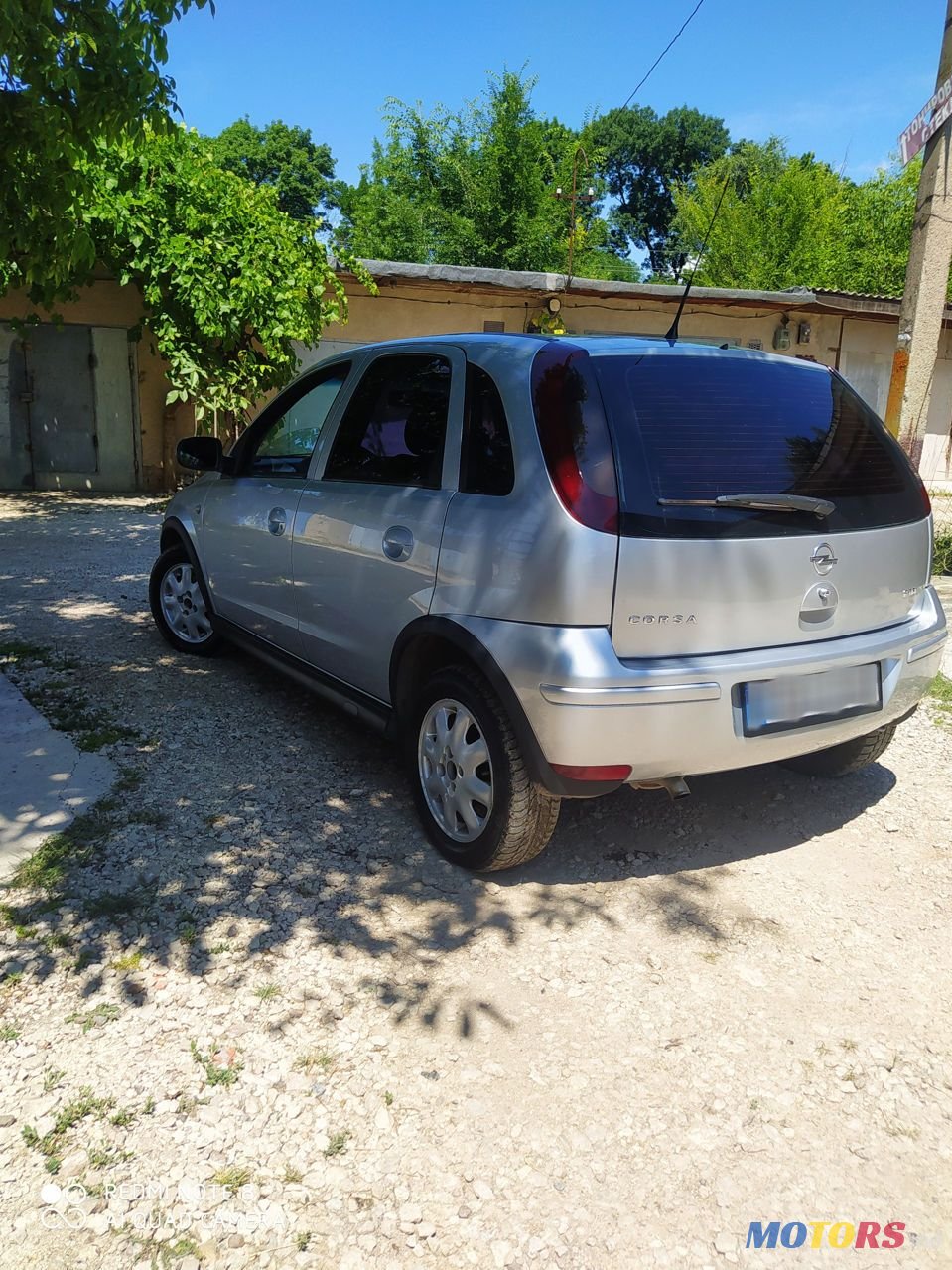 2004' Opel Corsa photo #2