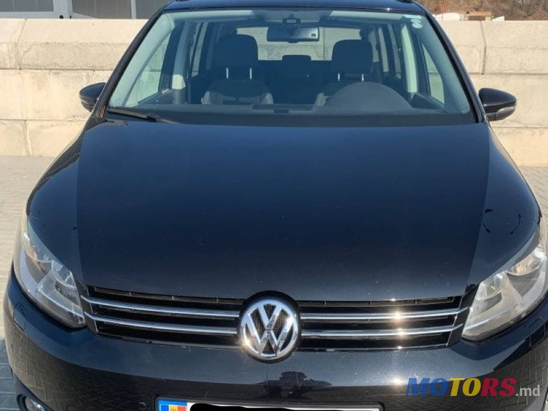 2014' Volkswagen Touran photo #1