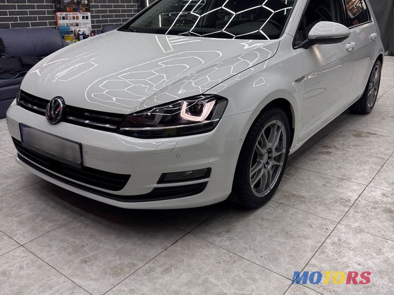 2014' Volkswagen Golf photo #2