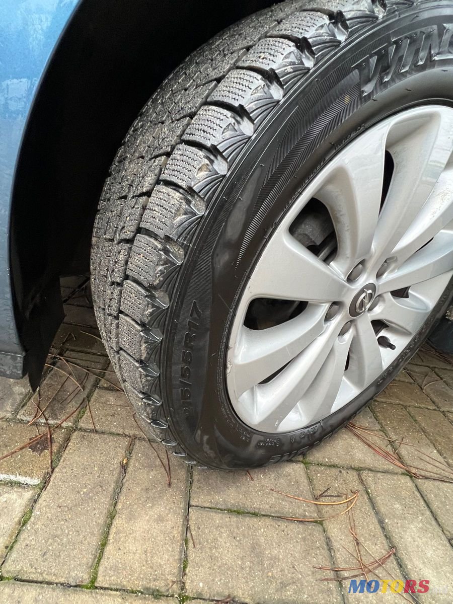 2014' Opel Astra photo #2