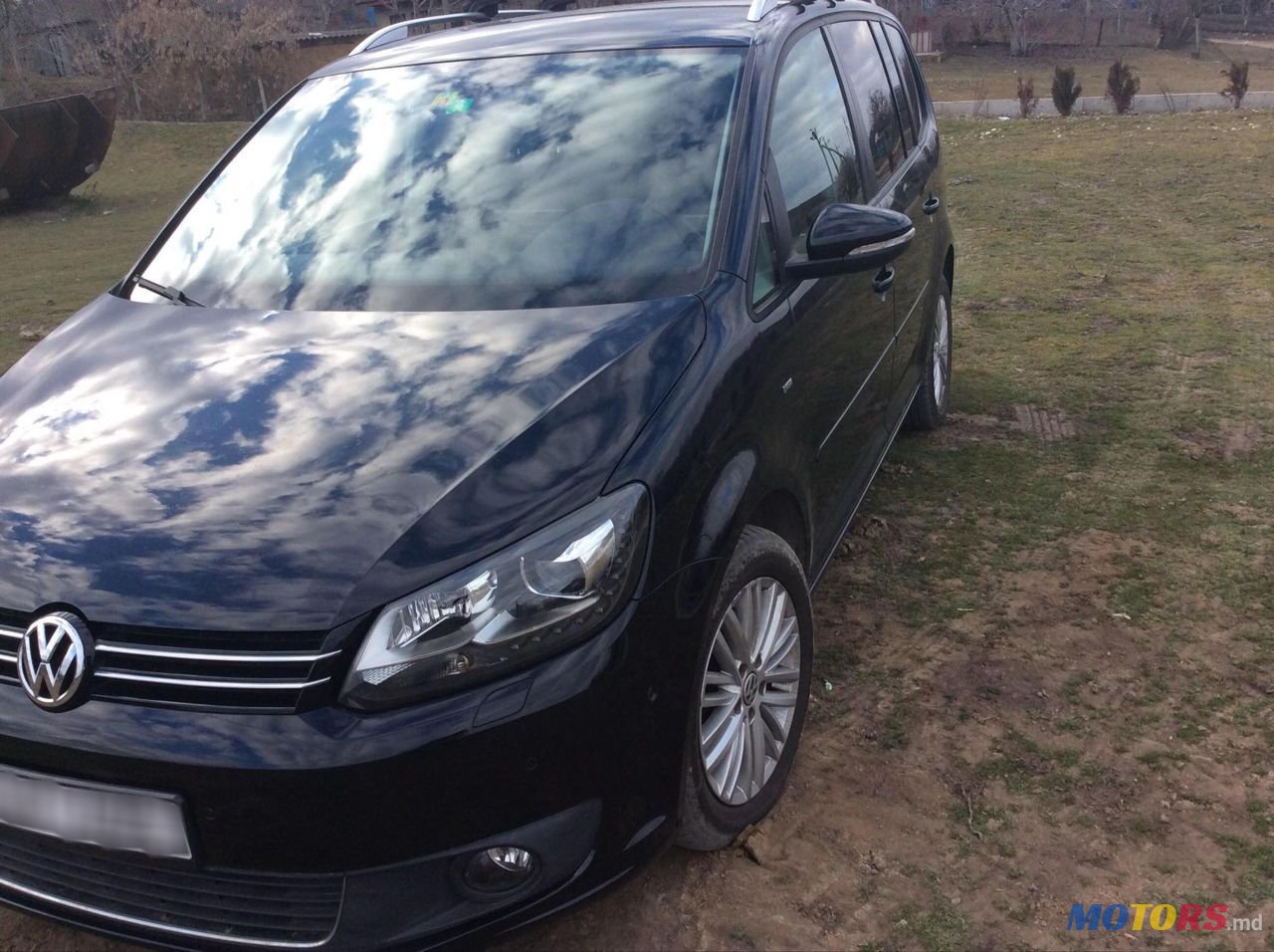 2014' Volkswagen Touran photo #1