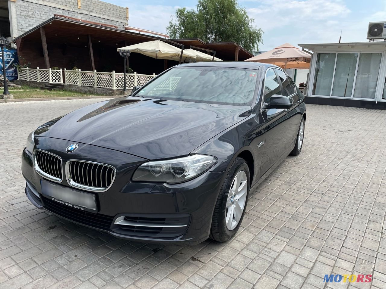 2016' BMW 5 Series photo #1