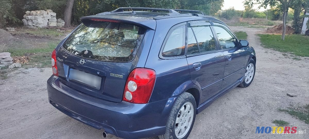 2002' Mazda 323 photo #4