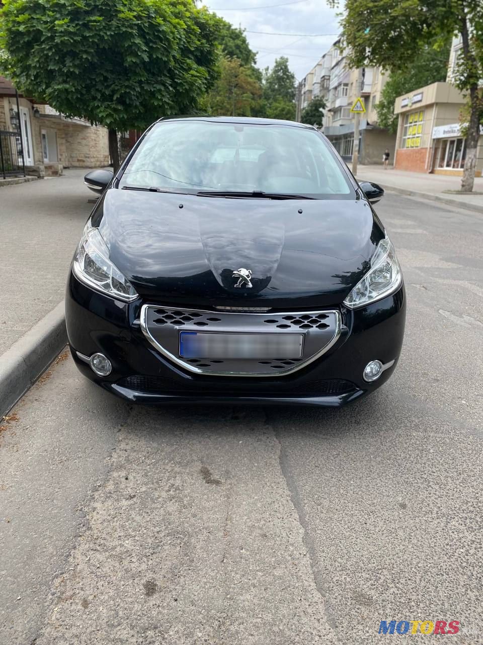 2012' Peugeot 208 photo #1
