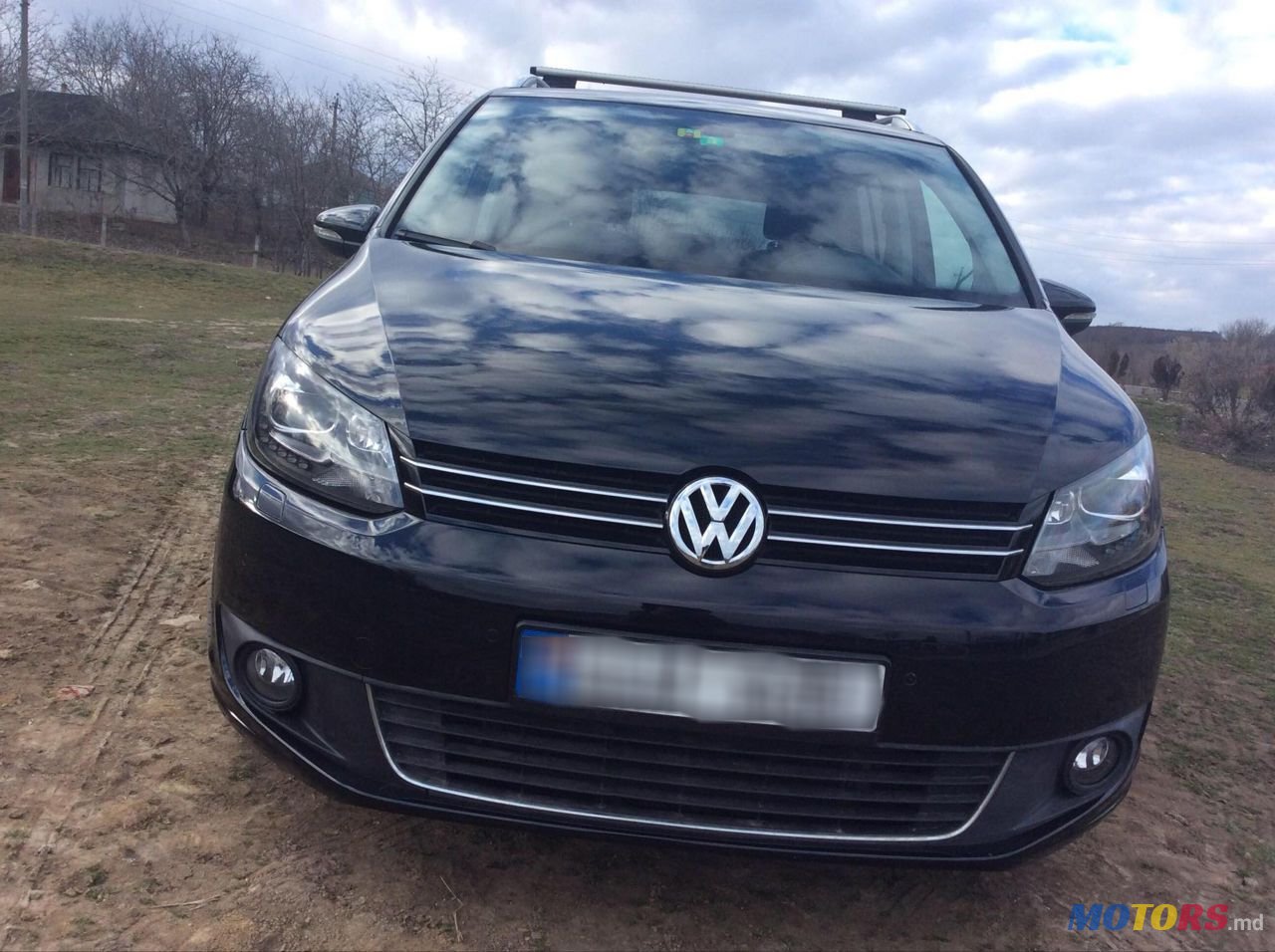 2014' Volkswagen Touran photo #3