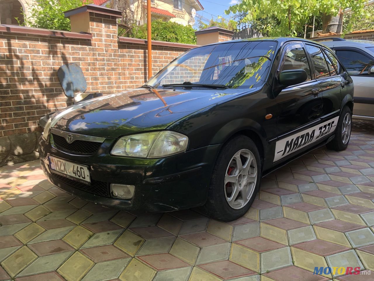 2000' Mazda 323 photo #1