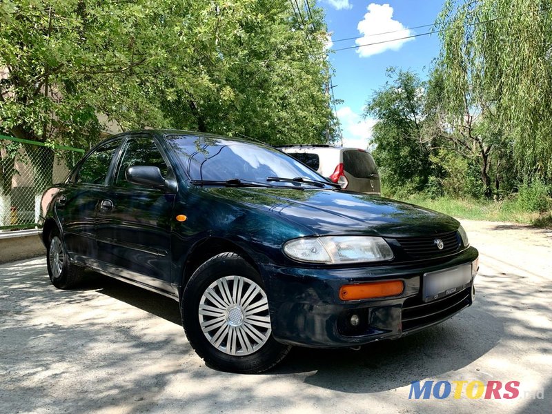 1994' Mazda 323 photo #1