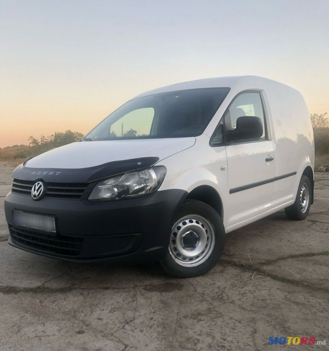 2011' Volkswagen Caddy photo #1