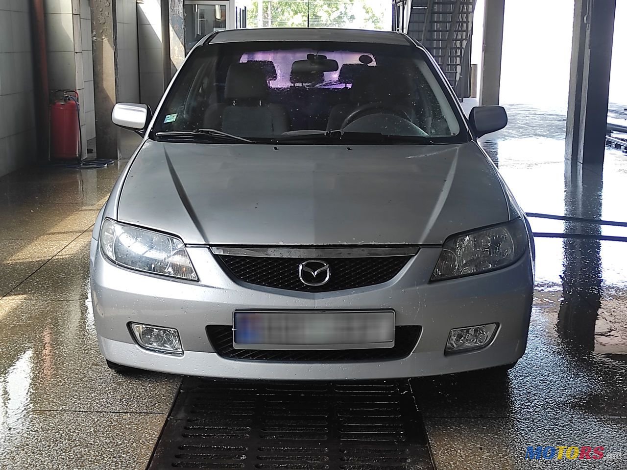 2001' Mazda 323 photo #6