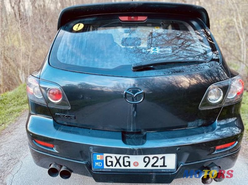 2004' Mazda 3 photo #1