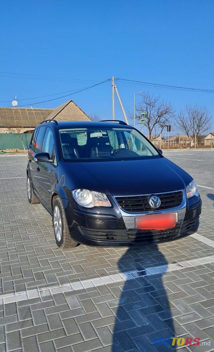 2007' Volkswagen Touran photo #1