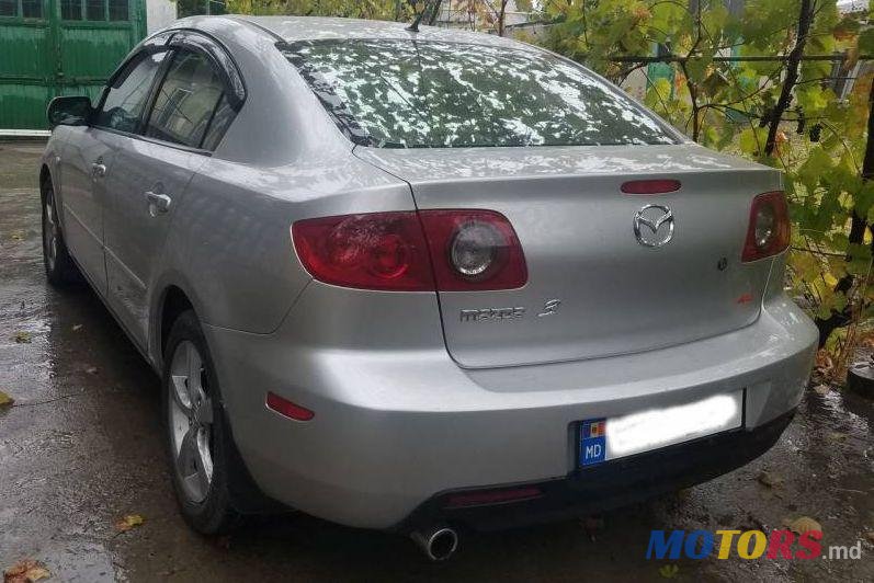 2004' Mazda 3 photo #1