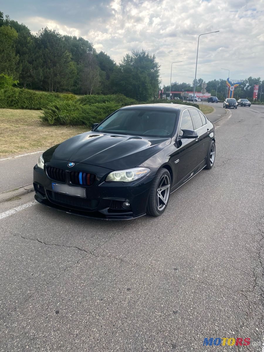 2014' BMW 5 Series photo #1