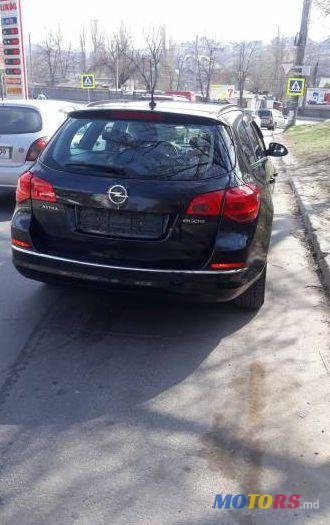 2013' Opel Astra photo #1