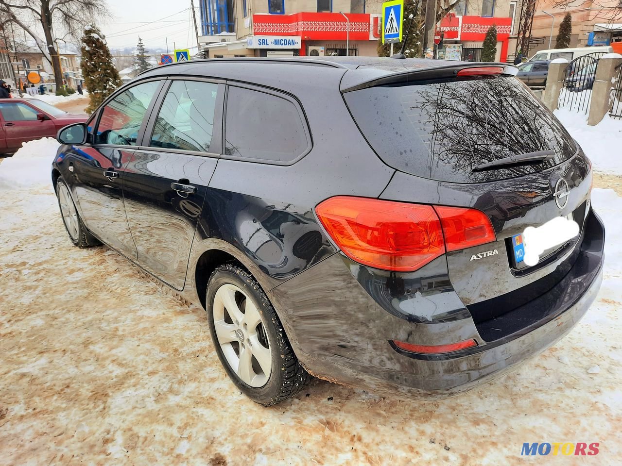 2011' Opel Astra photo #3