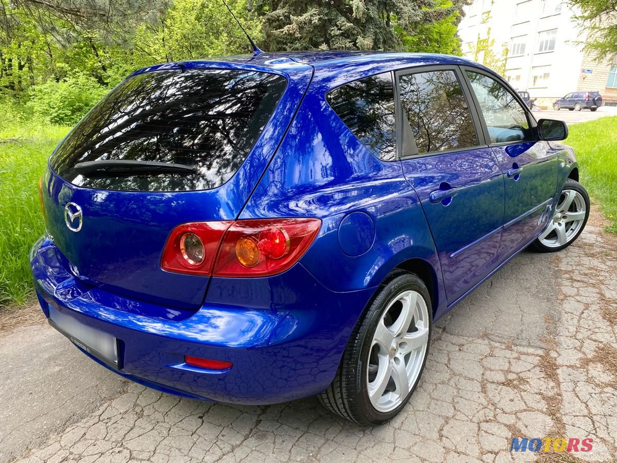 2004' Mazda 3 photo #4