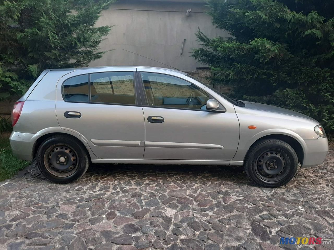 2006' Nissan Almera photo #1