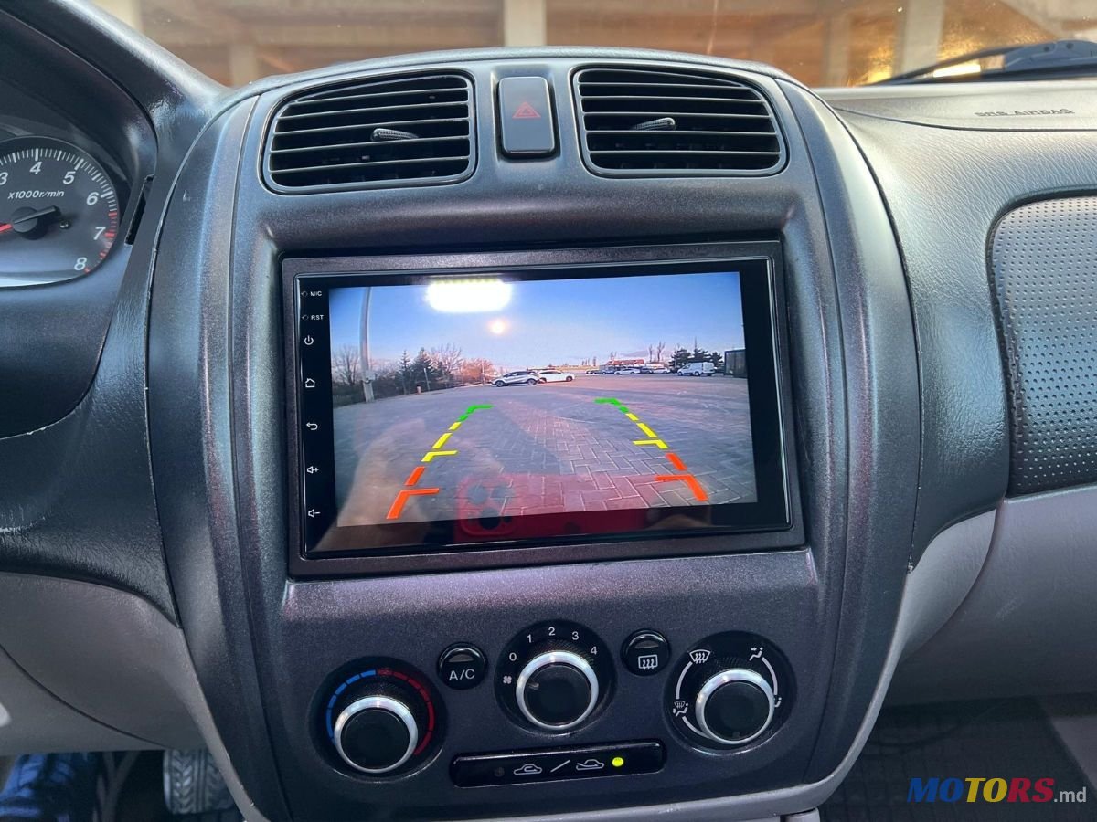 2001' Mazda 323 photo #5