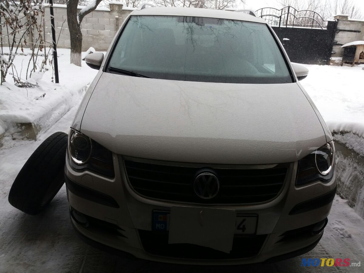 2010' Volkswagen Cross Touran Swiss Edition photo #1