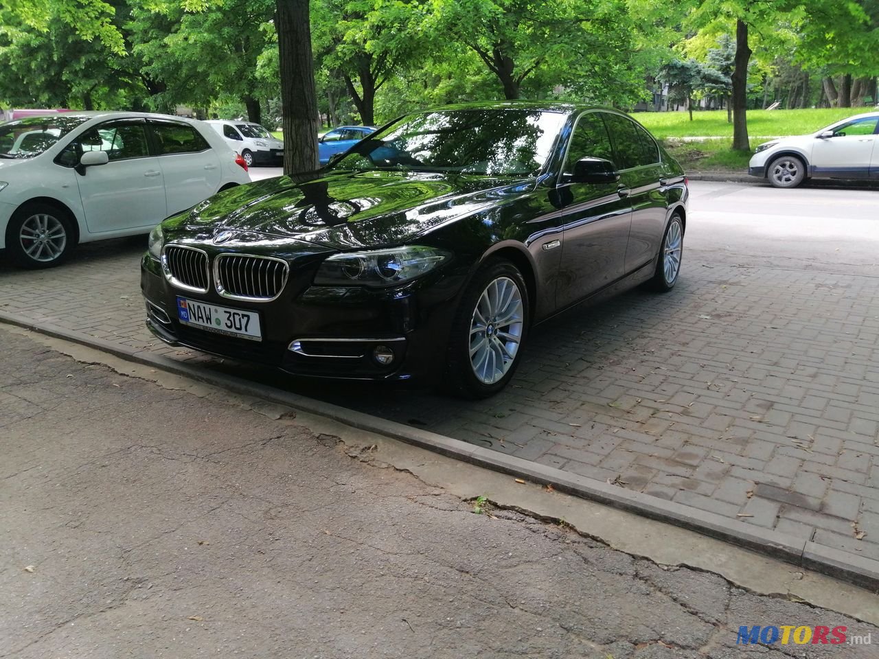 2014' BMW 5 Series photo #1