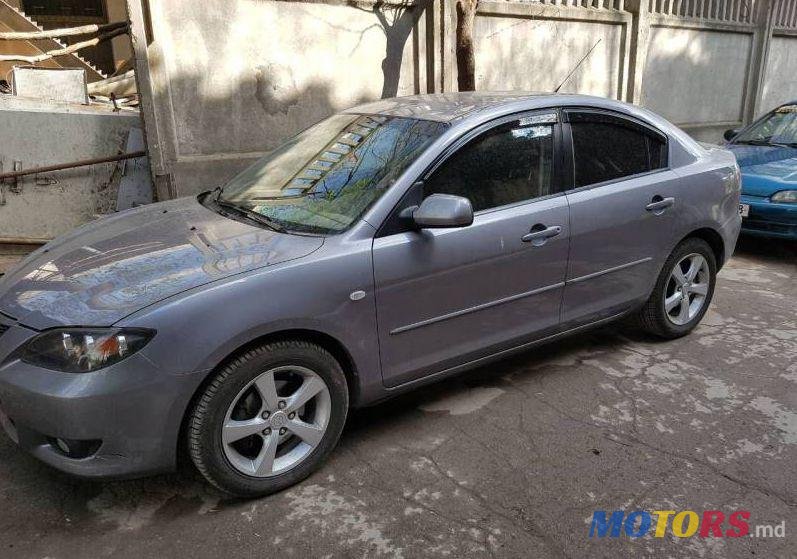 2004' Mazda 3 photo #1