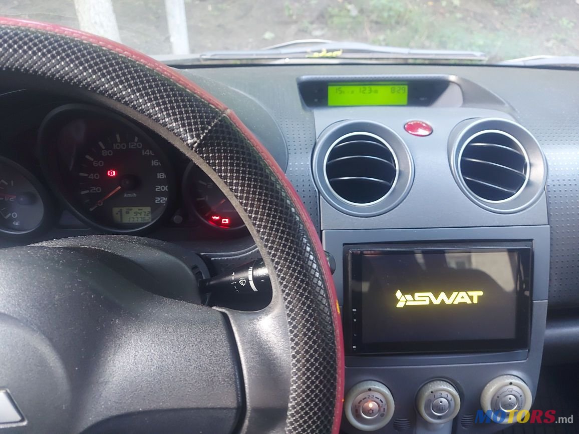 2008' Mitsubishi Colt photo #2