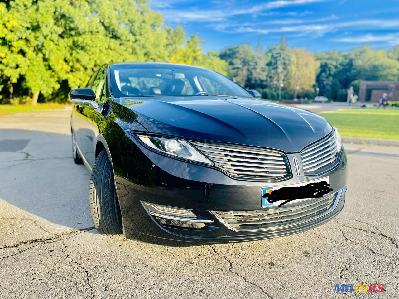 2014' Lincoln MKZ photo #1