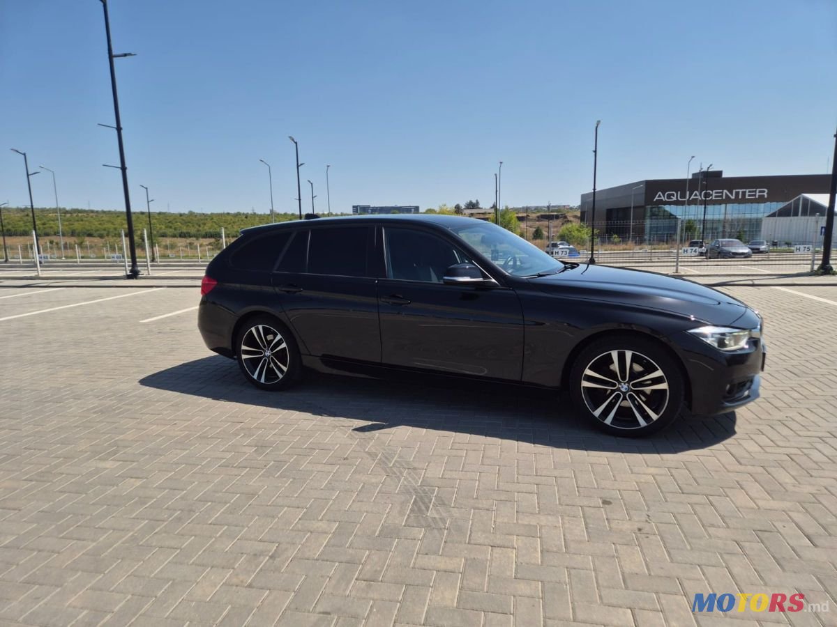 2017' BMW 3 Series Touring photo #4