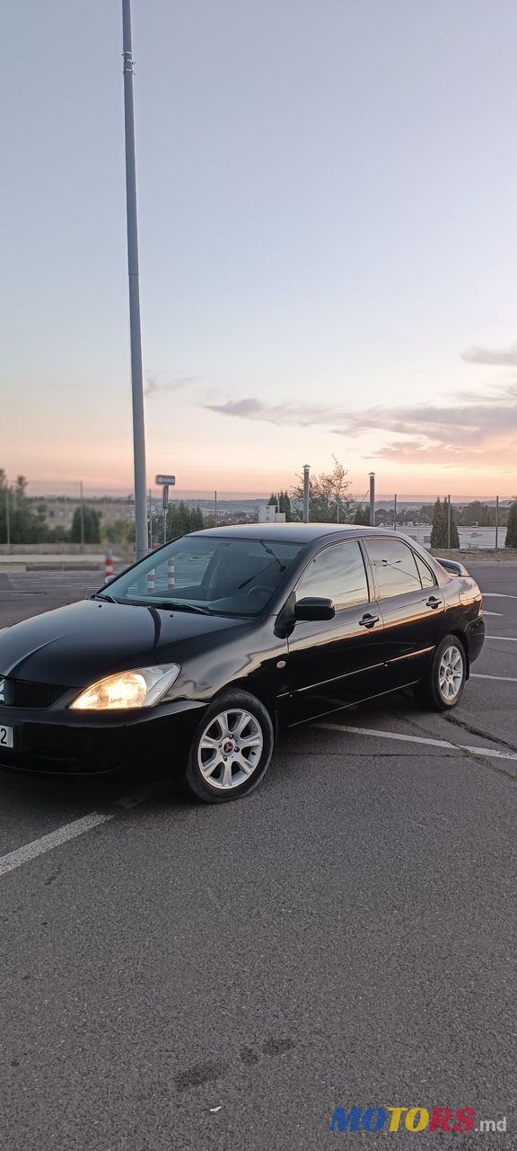 2008' Mitsubishi Lancer photo #3