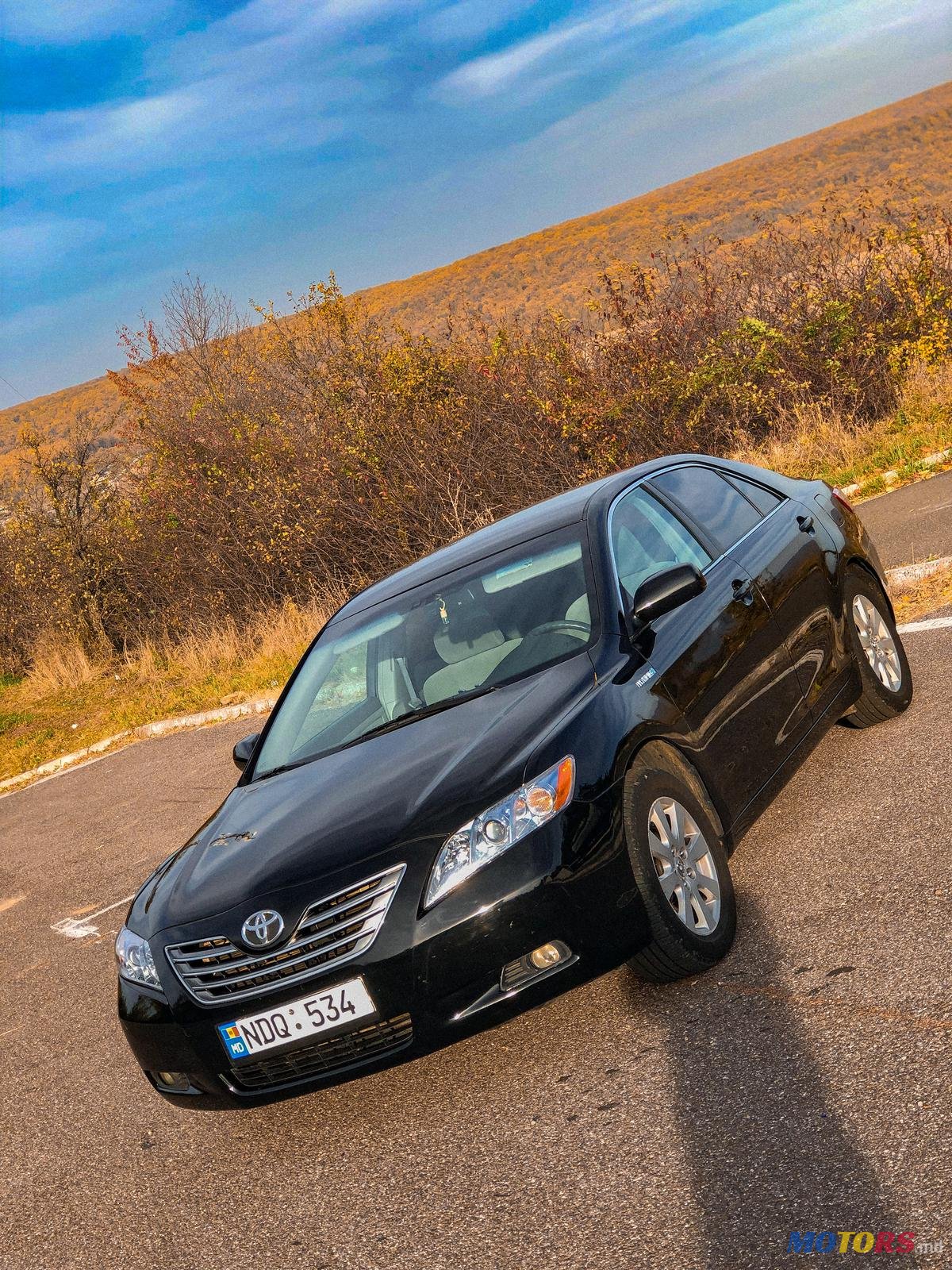 2009' Toyota Camry Седан photo #1