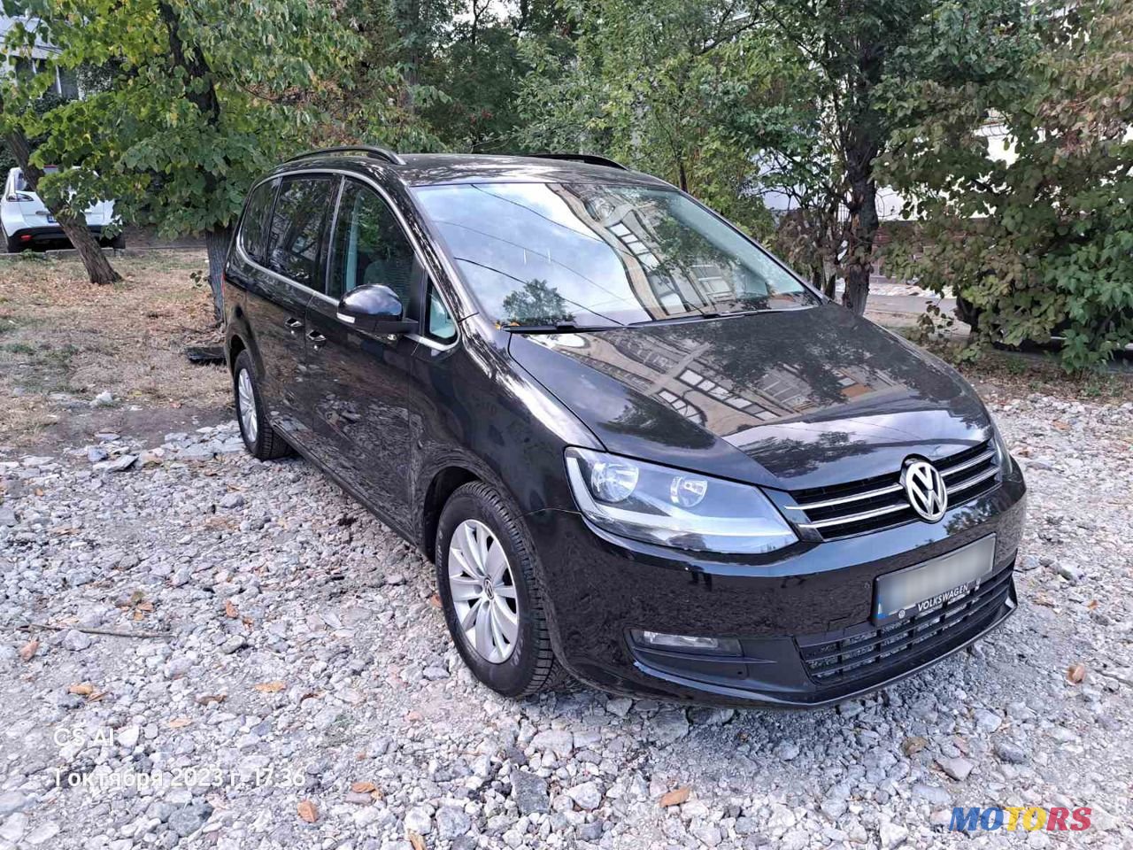 2011' Volkswagen Sharan photo #1