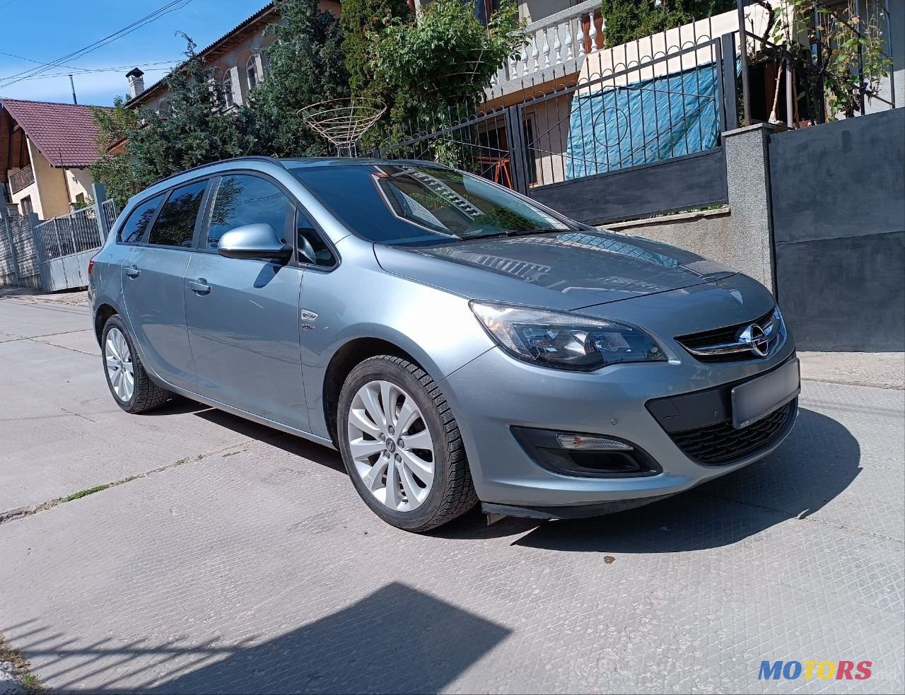 2013' Opel Astra photo #1