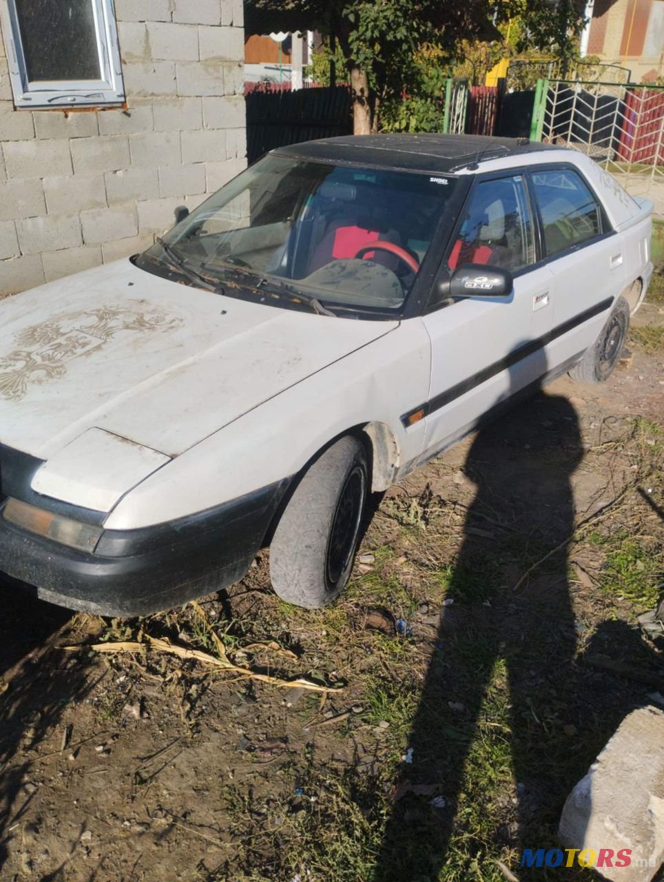 1994' Mazda 323 photo #1