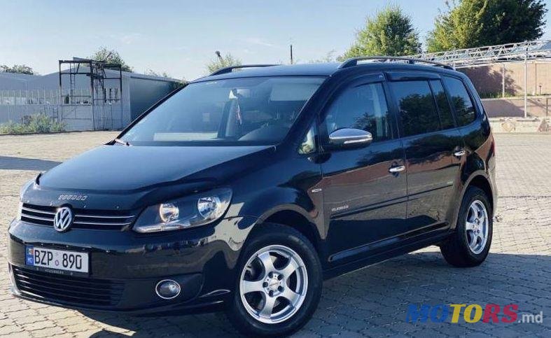 2013' Volkswagen Touran photo #1