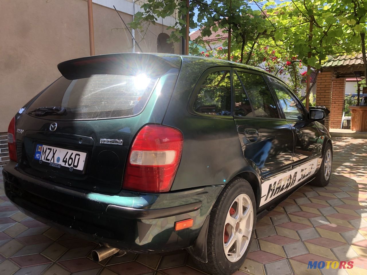 2000' Mazda 323 photo #5