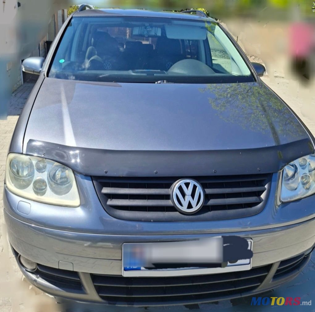 2004' Volkswagen Touran photo #1