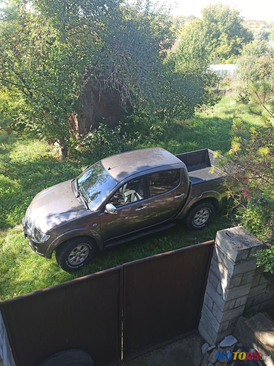 2013' Mitsubishi L Series photo #5