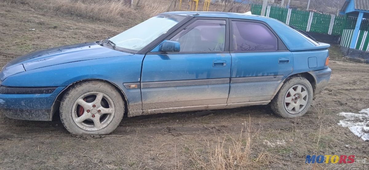 1994' Mazda 323 photo #3