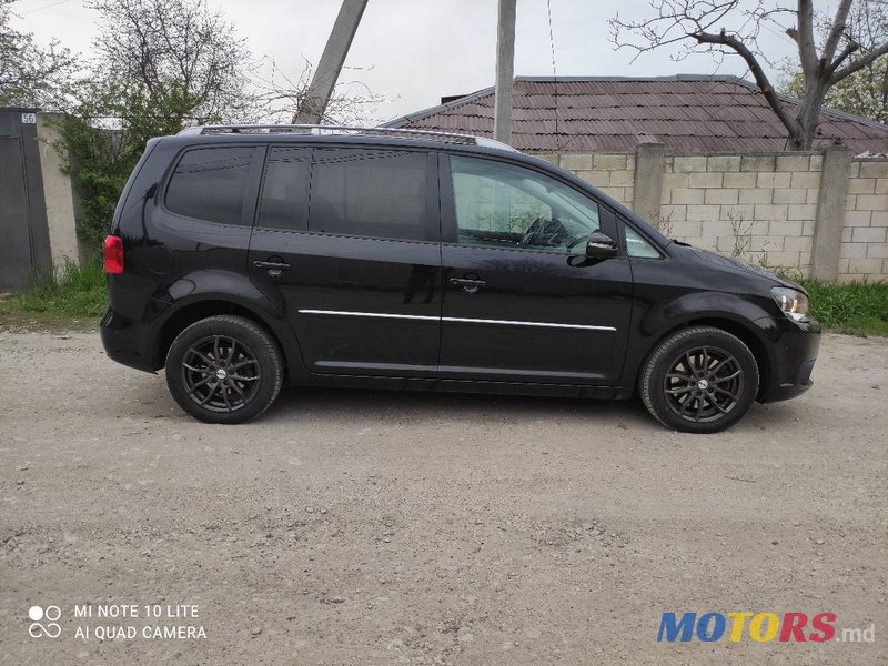 2014' Volkswagen Touran photo #3