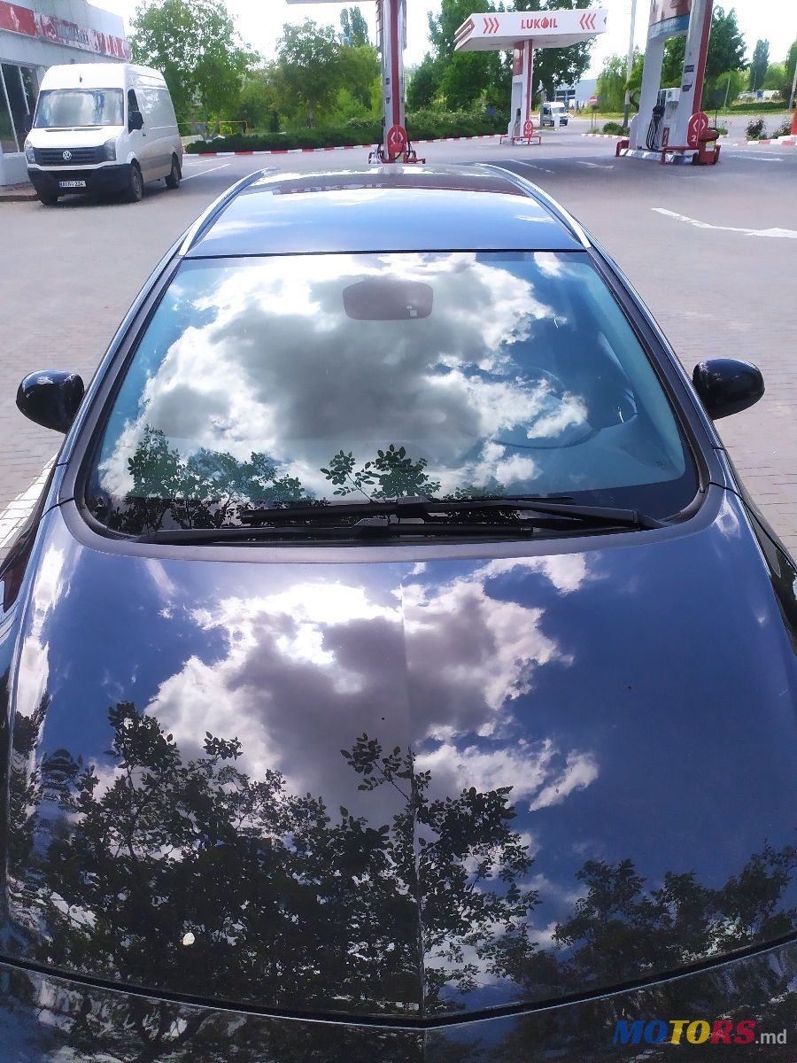 2011' Opel Astra photo #3