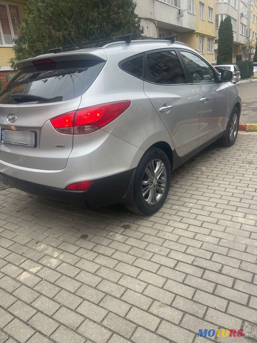 2013' Hyundai Tucson photo #3