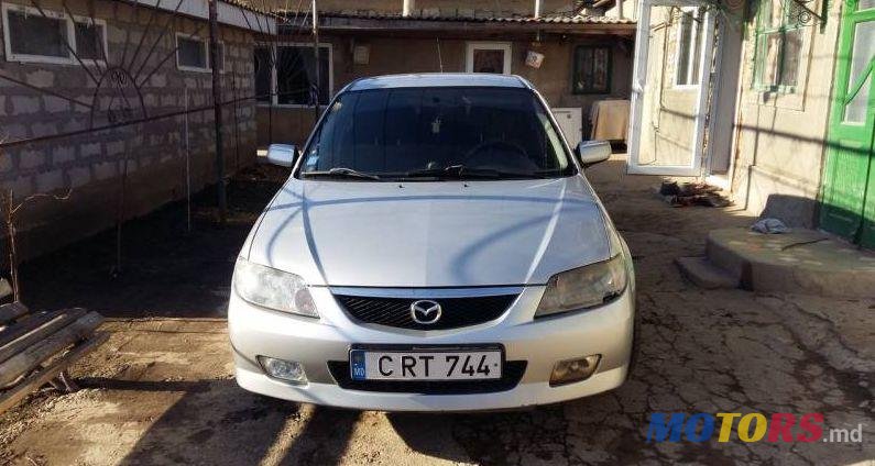 2001' Mazda 323 photo #1