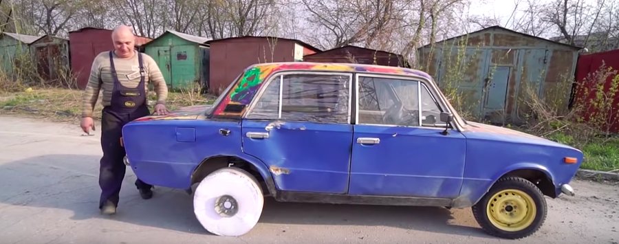 Russian guys make a wheel out of printer paper