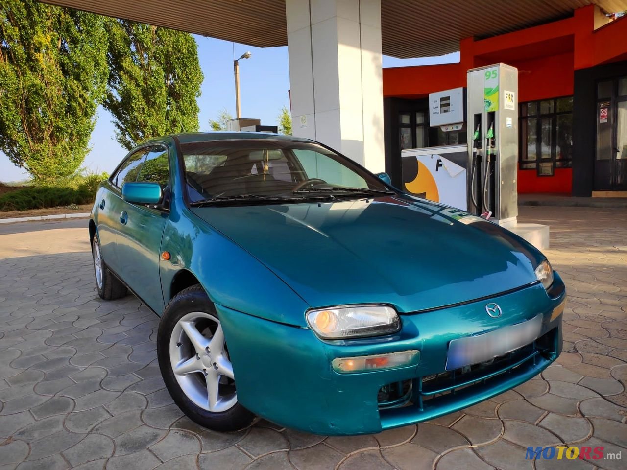 1998' Mazda 323 photo #2